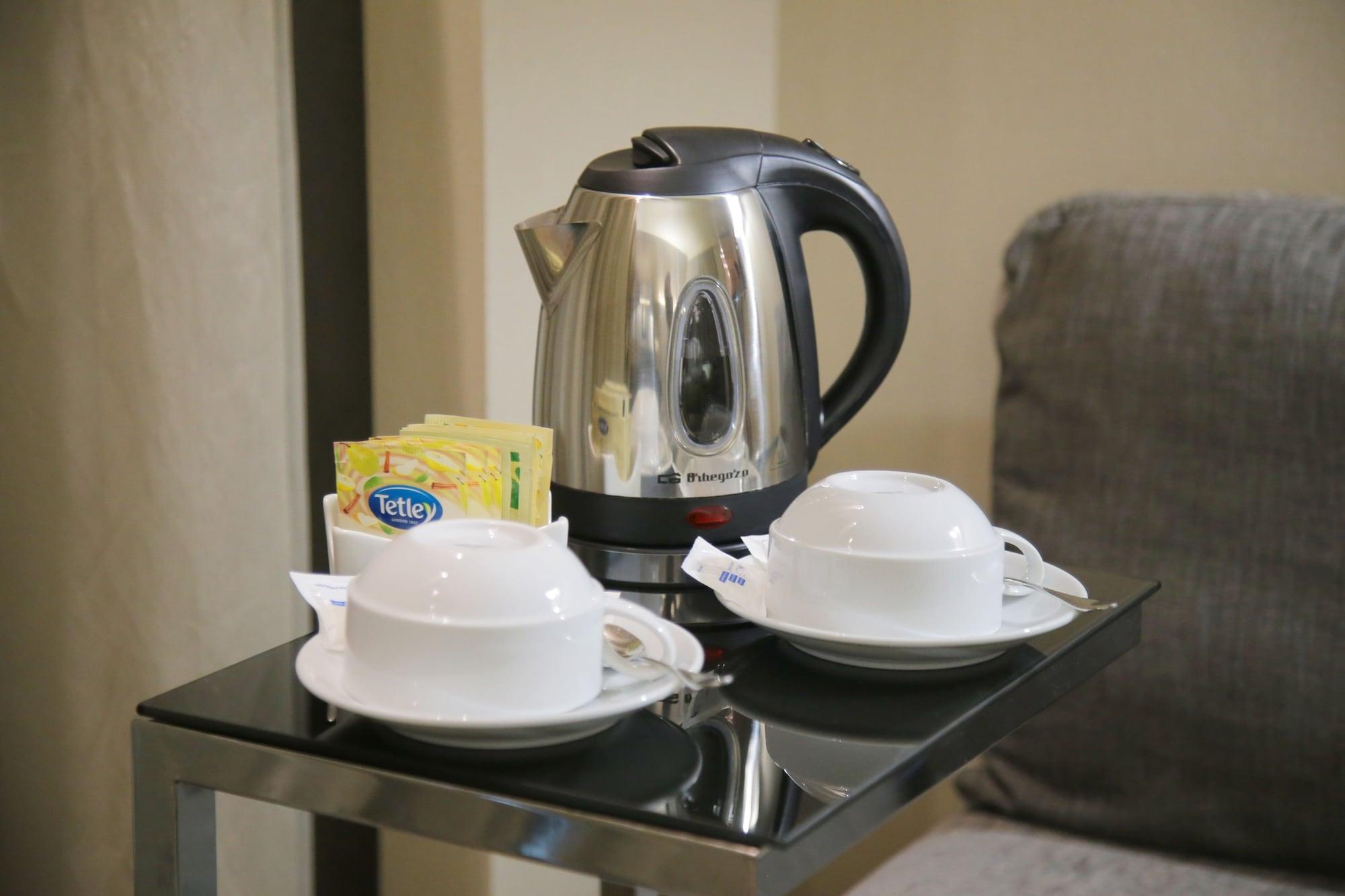 メリア ブラガ ホテル ＆ スパ エクステリア 写真 A kettle with two cups